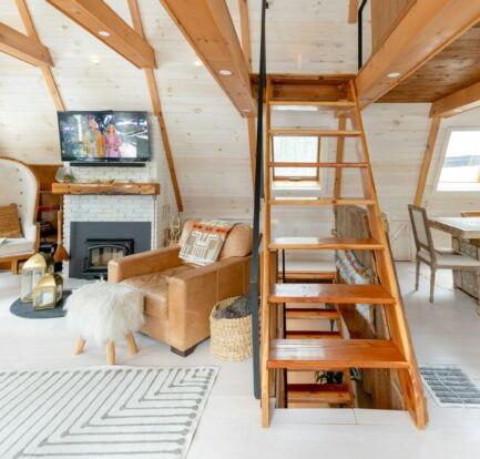 Modern home living room with loft ladder